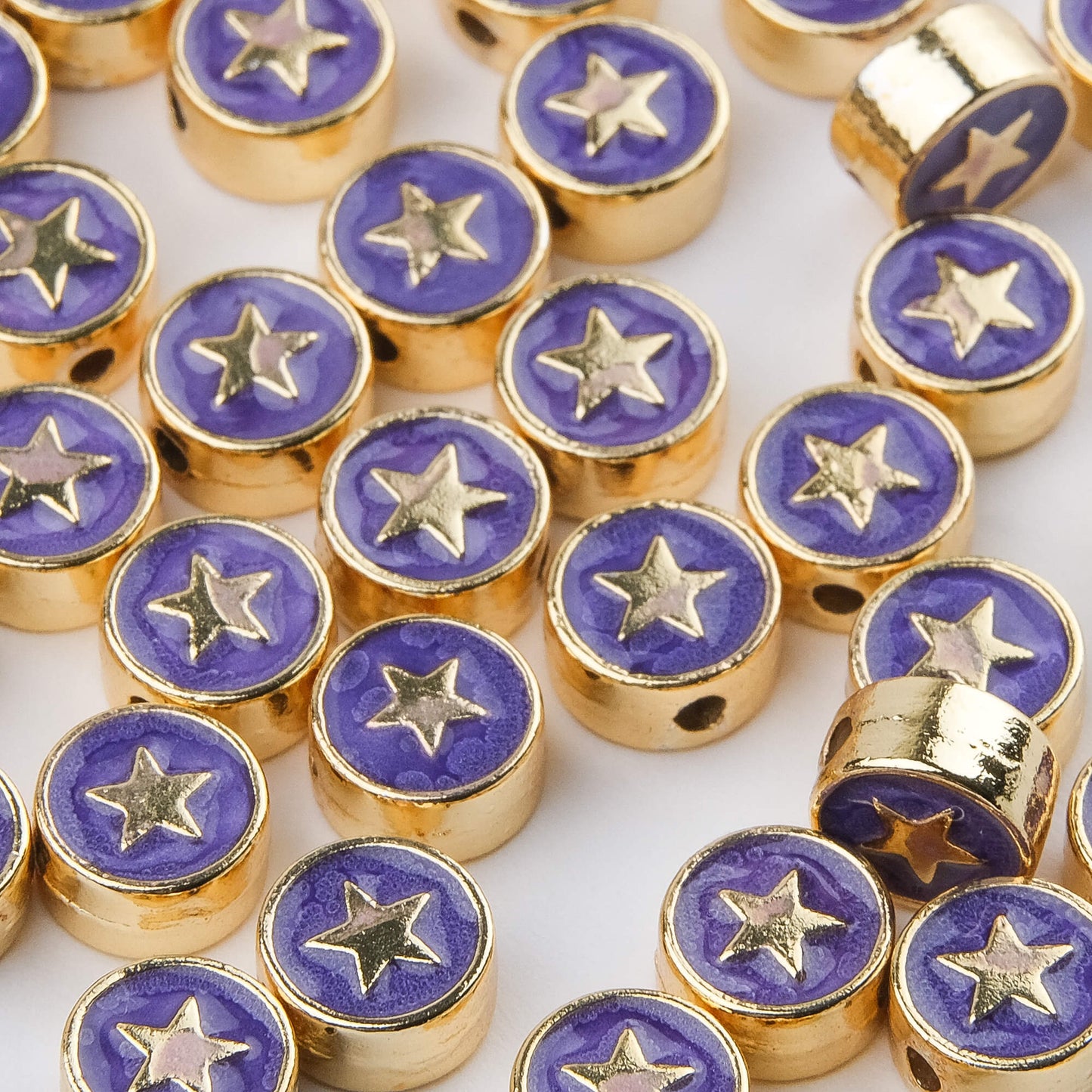 Enameled Embossed Star Beads